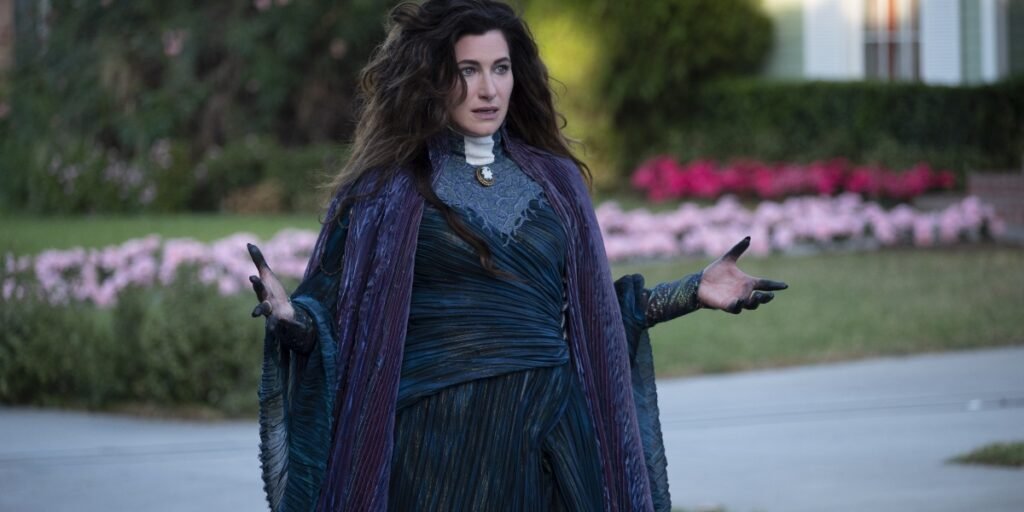 Kathryn Hahn as Agatha Harkness in her Salem Witch suit stood in the street as she is about to fight Wanda in WandaVision | Agents of Fandom