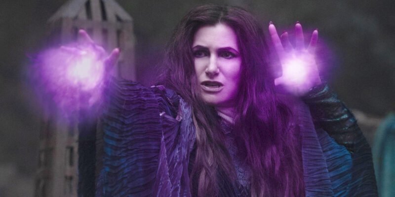 Agatha Holding her hands up with purple powers about to blast out in Agatha All Along | Agents of Fandom