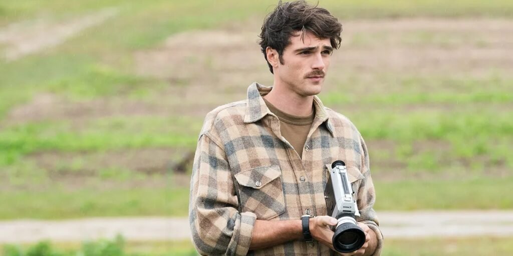 Jacob Elordi holding a film camera in an open field in Paul Schrader's Oh, Canada | Agents of Fandom