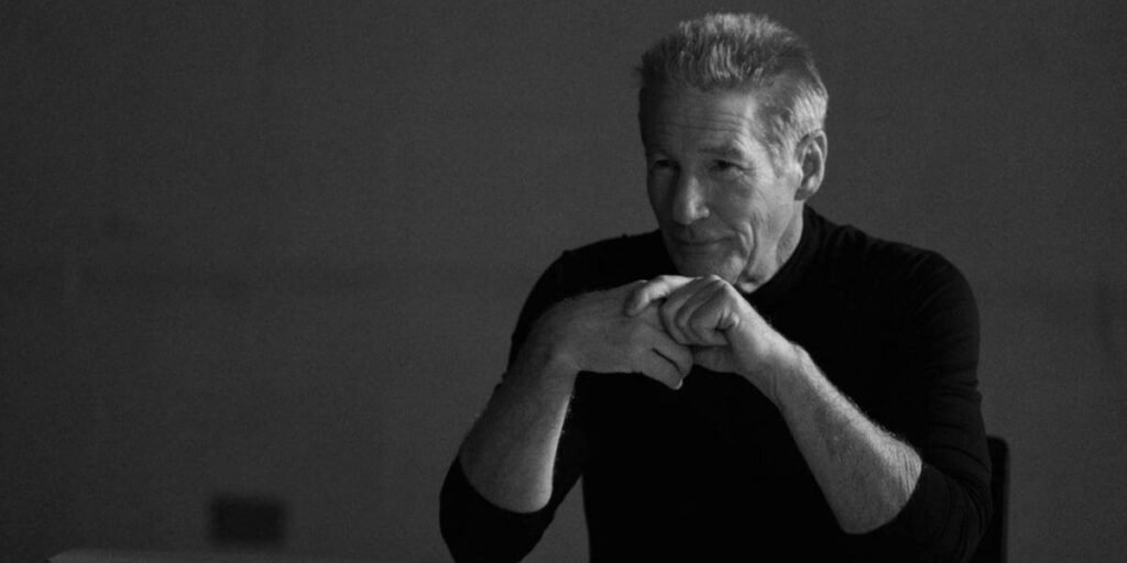 Richard Gere leaning on his elbows in a black-and-white image from Oh, Canada | Agents of Fandom