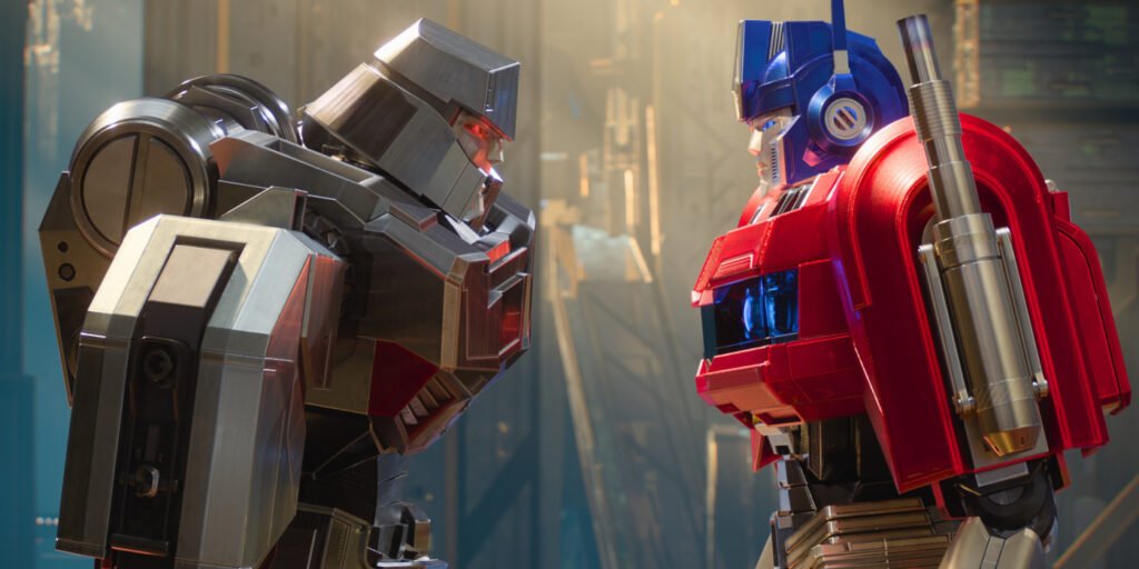 D-16/Megatron (Brian Tyree Henry) facing off against Orion Pax/Optimus Prime (Chris Hemsworth) in Transformers One | Agents of Fandom