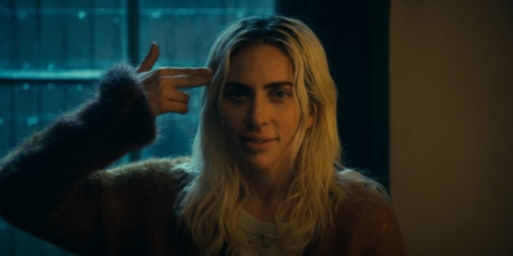 Lady Gaga holding a finger gun to her head in Joker 2 | Agents of Fandom