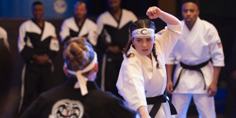 Sam LaRusso (Mary Mouser) does a fighting stance against Tory Nichols (Peyton List) in Cobra Kai Season 6, Episode 9 | Agents of Fandom