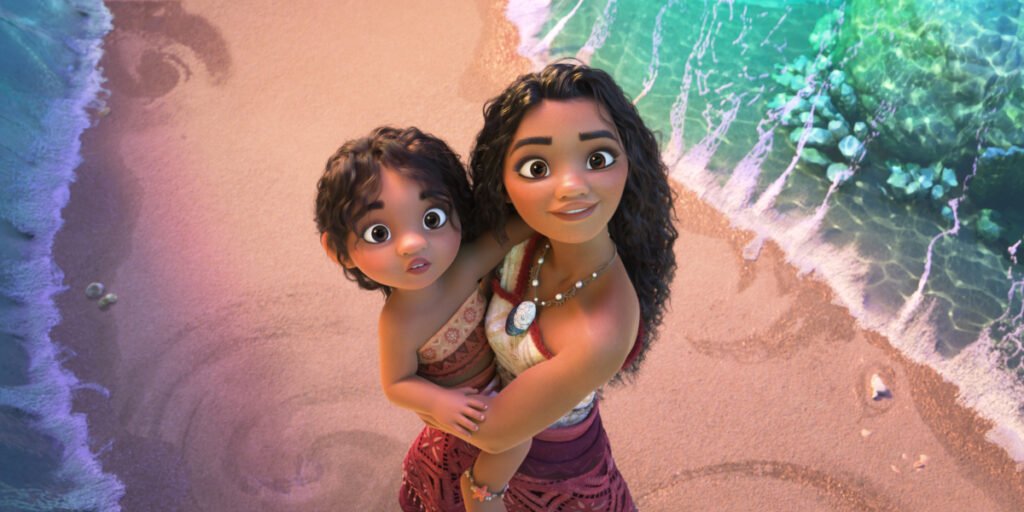 Simea (Khaleesi Lambert-Tsuda) looking stunned as Moana (Auliʻi Cravalho) carries her in the ocean as the water is parted in Moana 2 | Agents of Fandom