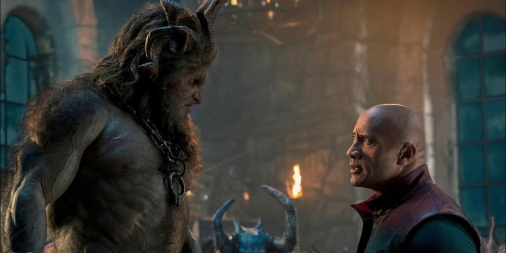 The Rock and Kristopher Hivju as Krampus standing face to face in Red One | Agents of Fandom