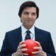 Adam Scott holding a red ball in Severance Season 2 | Agents of Fandom