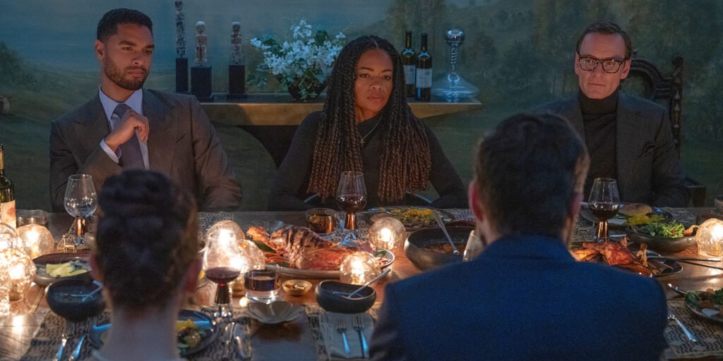 Regé-Jean Page, Naomie Harris, Michael Fassbender and more sitting around a dinnertable in Black Bag | Agents of Fandom