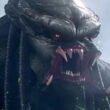 A Yautja with green blood opening it's mouth in Predator: Killer of Killers | Agents of Fandom