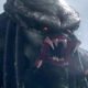 A Yautja with green blood opening it's mouth in Predator: Killer of Killers | Agents of Fandom