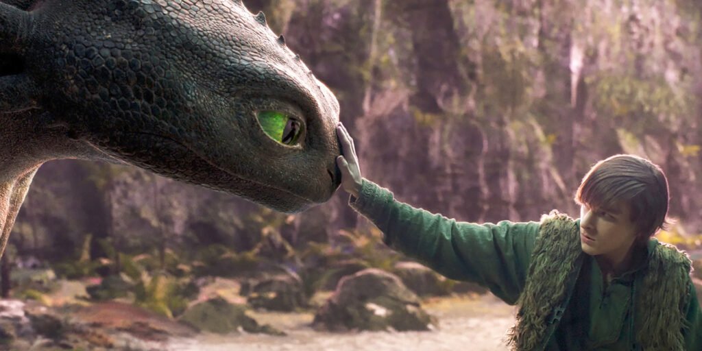 Hiccup reaching out to touch Toothless in the How To Train Your Dragon Live Action Remake | Agents of Fandom