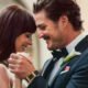 Lucy (Dakota Johnson) and Harry (Pedro Pascal) smiling while dancing at a wedding in Materialists | Agents of Fandom