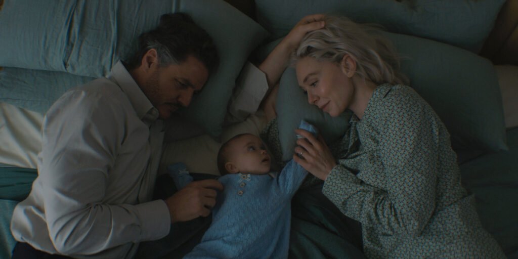 Reed Richards, Franklin Richards, and Sue Storm in bed in The Fantastic Four: First Steps | Agents of Fandom