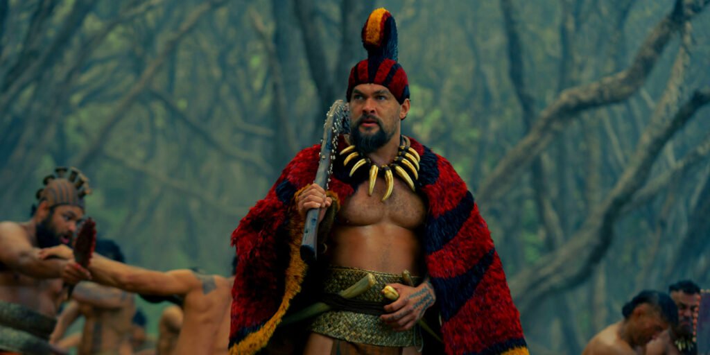 Jason Momoa as Ka'iana holding a club in Chief of War | Agents of Fandom