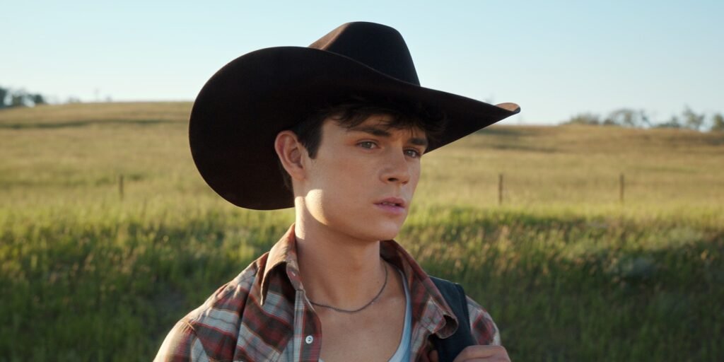 Ashby Gentry as Alex Walter looks pensively wearing a large cowboy hat in My Life With The Walter Boys Season 2 | Agents of Fandom