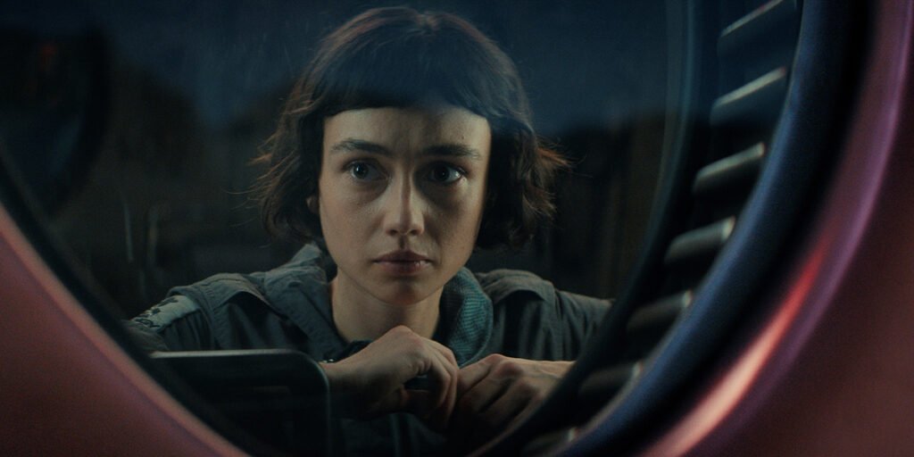Sydney Chandler as Wendy in 'Alien: Earth' gazes out the window in wonder | Agents of Fandom