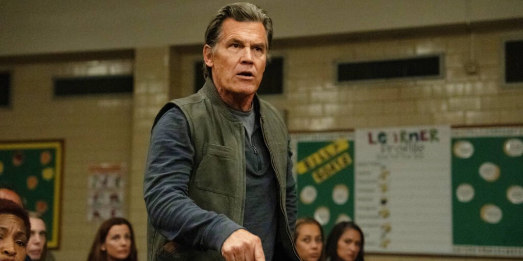 Josh Brolin angrily pointing his finger at a PTA meeting in Weapons | Agents of Fandom