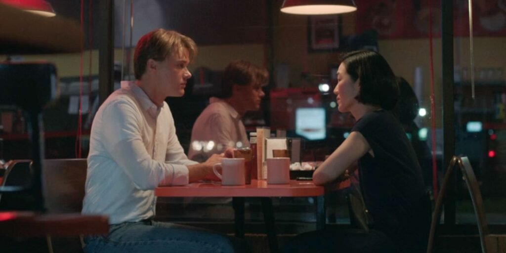 Conrad (Christopher Briney) and Laurel (Jackie Chung) share a heart-to-heart in a diner. | Agents of Fandom