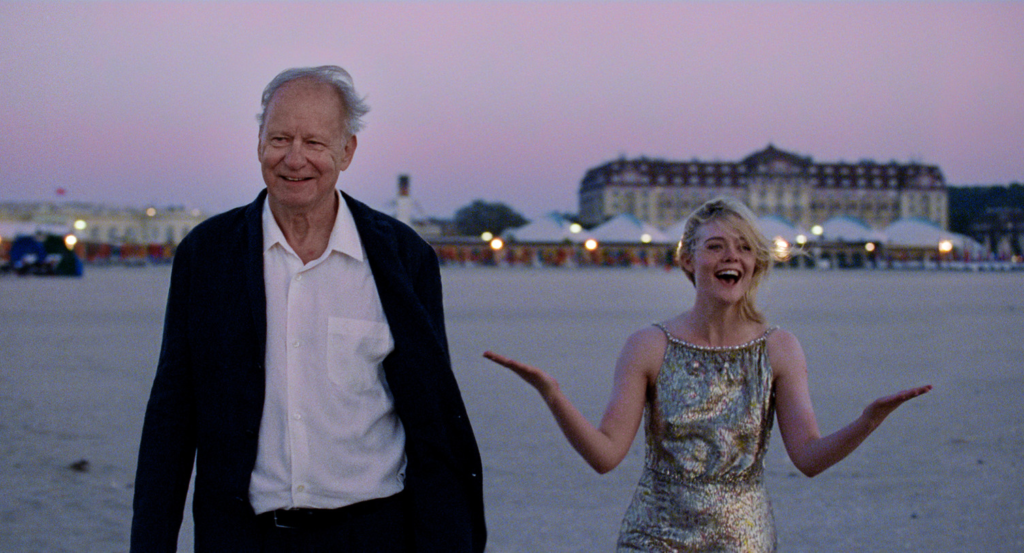 Gustav (Stellan Skarsgård, left) and Rachel Kemp (Elle Fanning, right) experience a magical meeting during an international film festival in Sentimental Value | Agents of Fandom