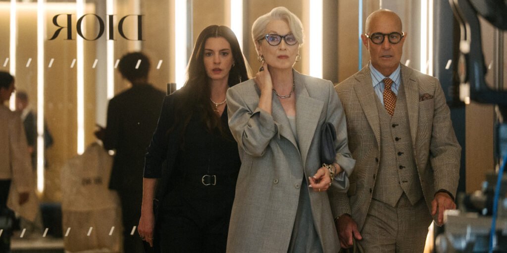Andy Sachs, Miranda Priestly, and Nigel walking into Dior in The Devil Wears Prada 2 | Agents of Fandom