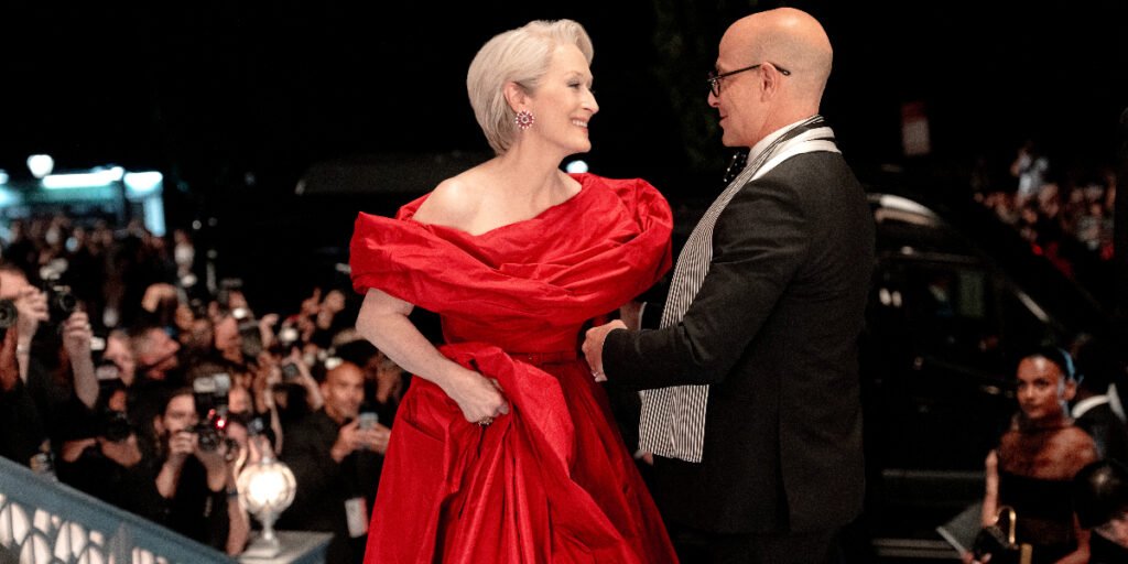 Miranda and Nigel smile at each other in The Devil Wears Prada 2 | Agents of Fandom