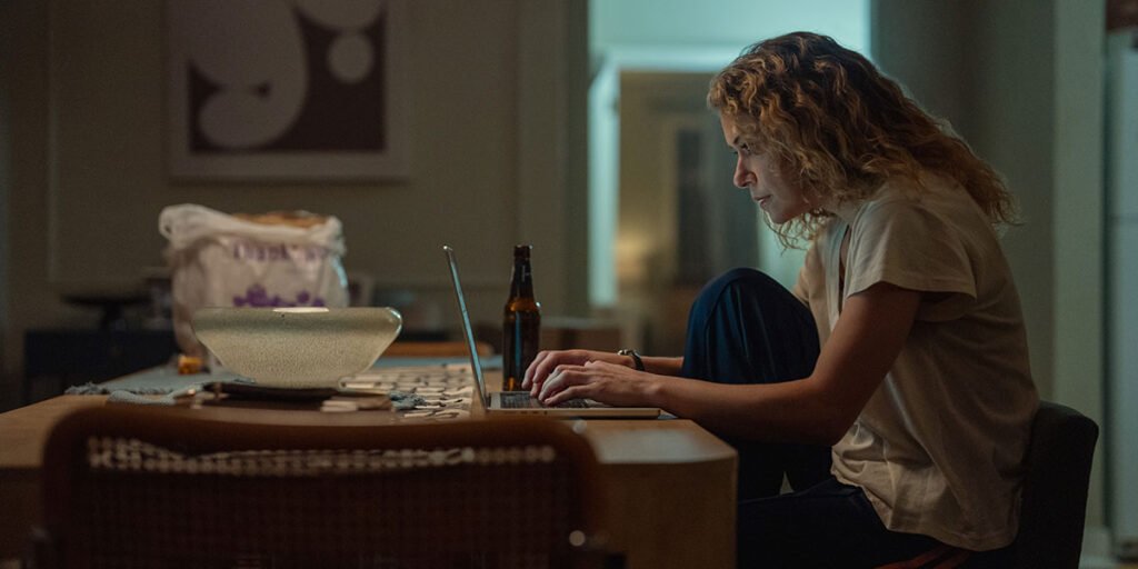 Paula types on her laptop in 'Maximum Pleasure Guaranteed' | Agents of Fandom