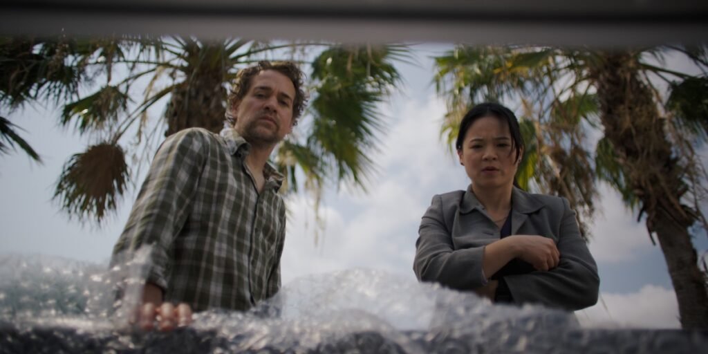 Edmund Donovan and Kelly Marie Tran looking disappointed in Forge | Agents of Fandom