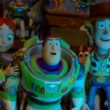 Jessie, Buzz, and Woody looking at Lilypad.