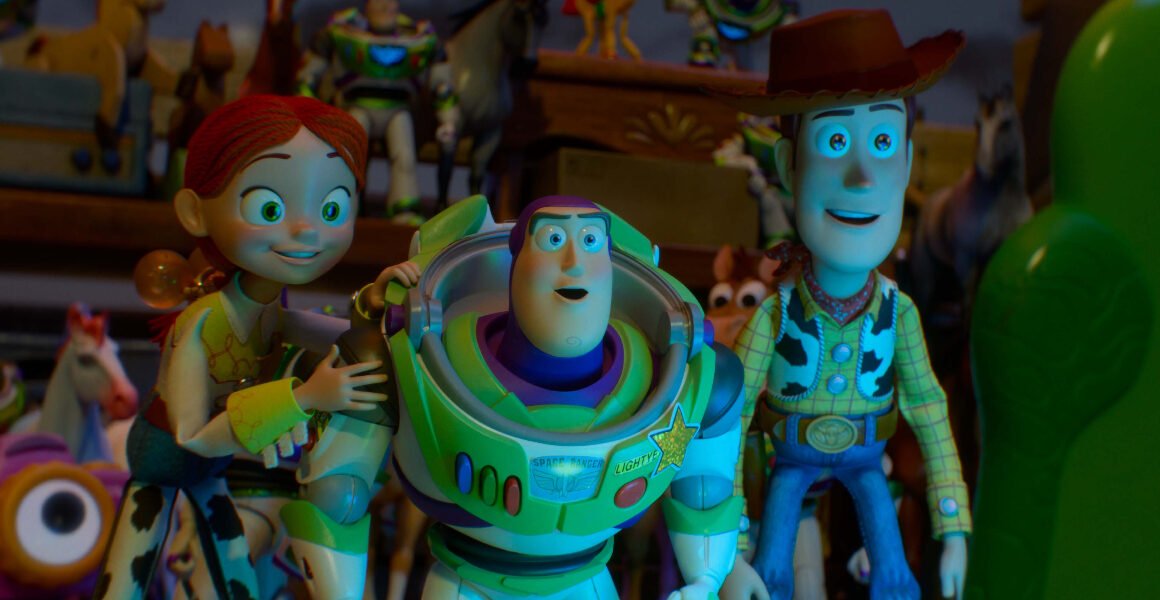Jessie, Buzz, and Woody looking at Lilypad.