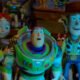 Jessie, Buzz, and Woody looking at Lilypad.